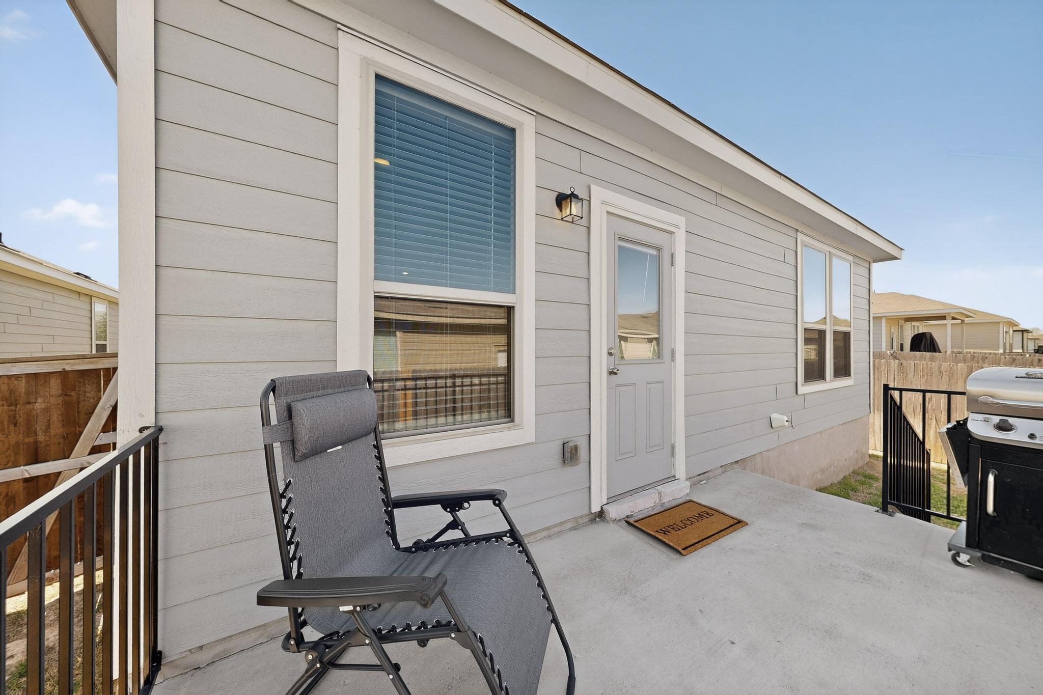 429 Stone Water Lane Jarrell, TX 76537 - Photo 32 of 37 a view of a house with lounge chair
