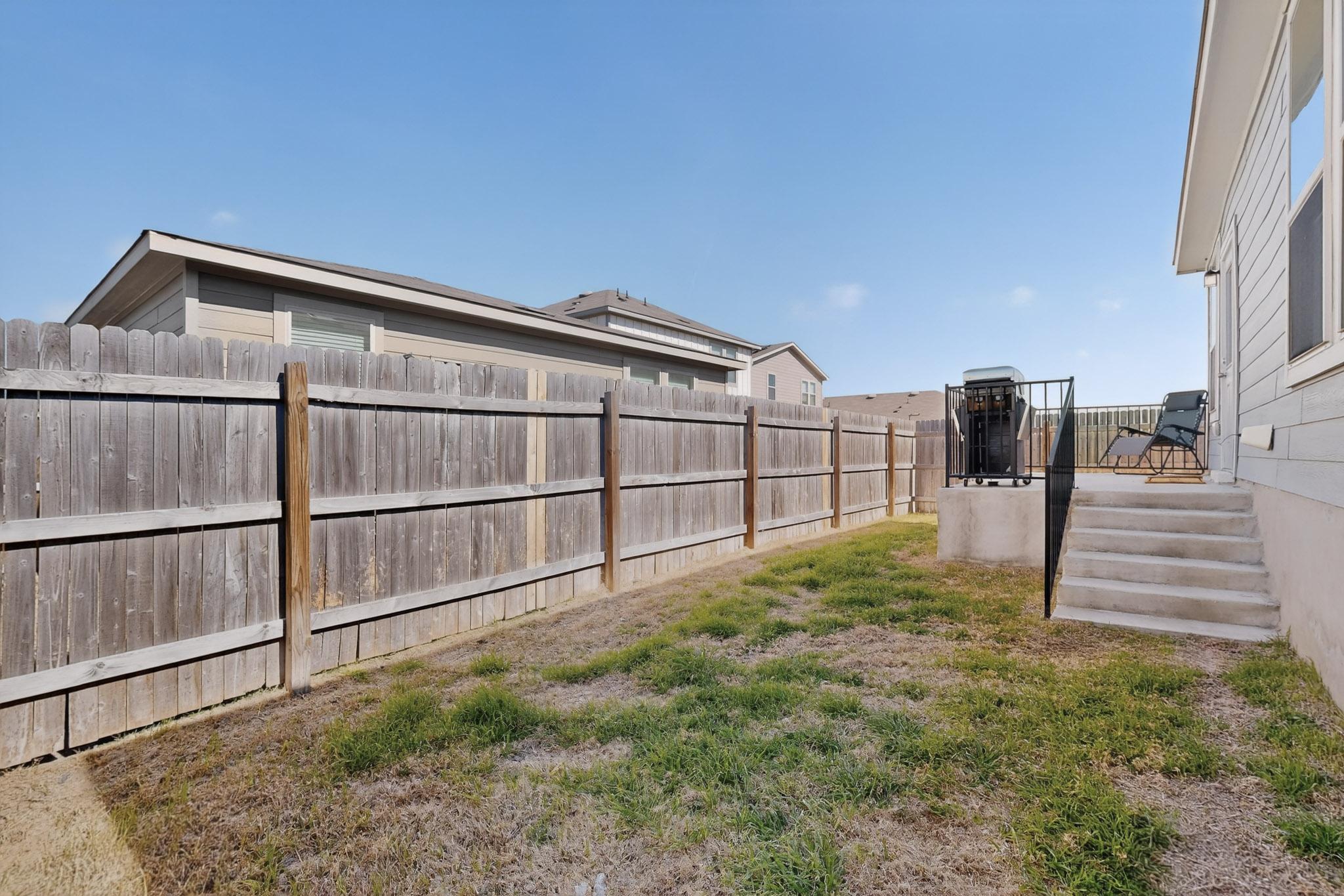 429 Stone Water Lane Jarrell, TX 76537 - Photo 36 of 37 a view of a backyard