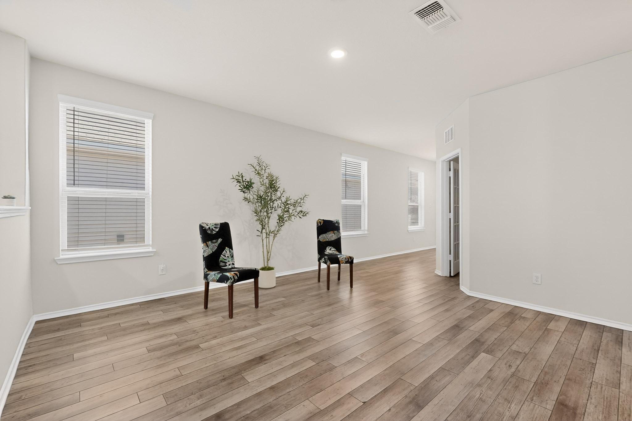429 Stone Water Lane Jarrell, TX 76537 - Photo 5 of 37 a living room with furniture and a window