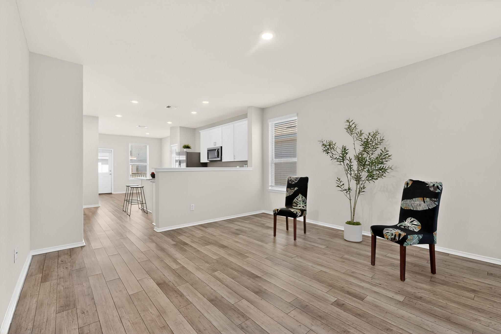 429 Stone Water Lane Jarrell, TX 76537 - Photo 6 of 37 a living room with furniture and a table