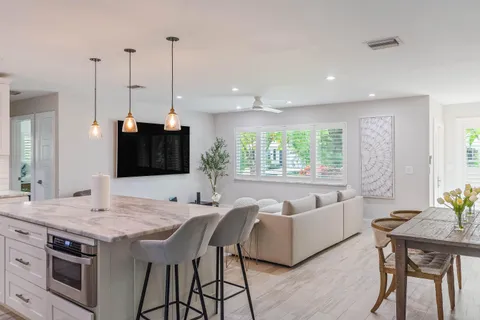 a living room with furniture and a table