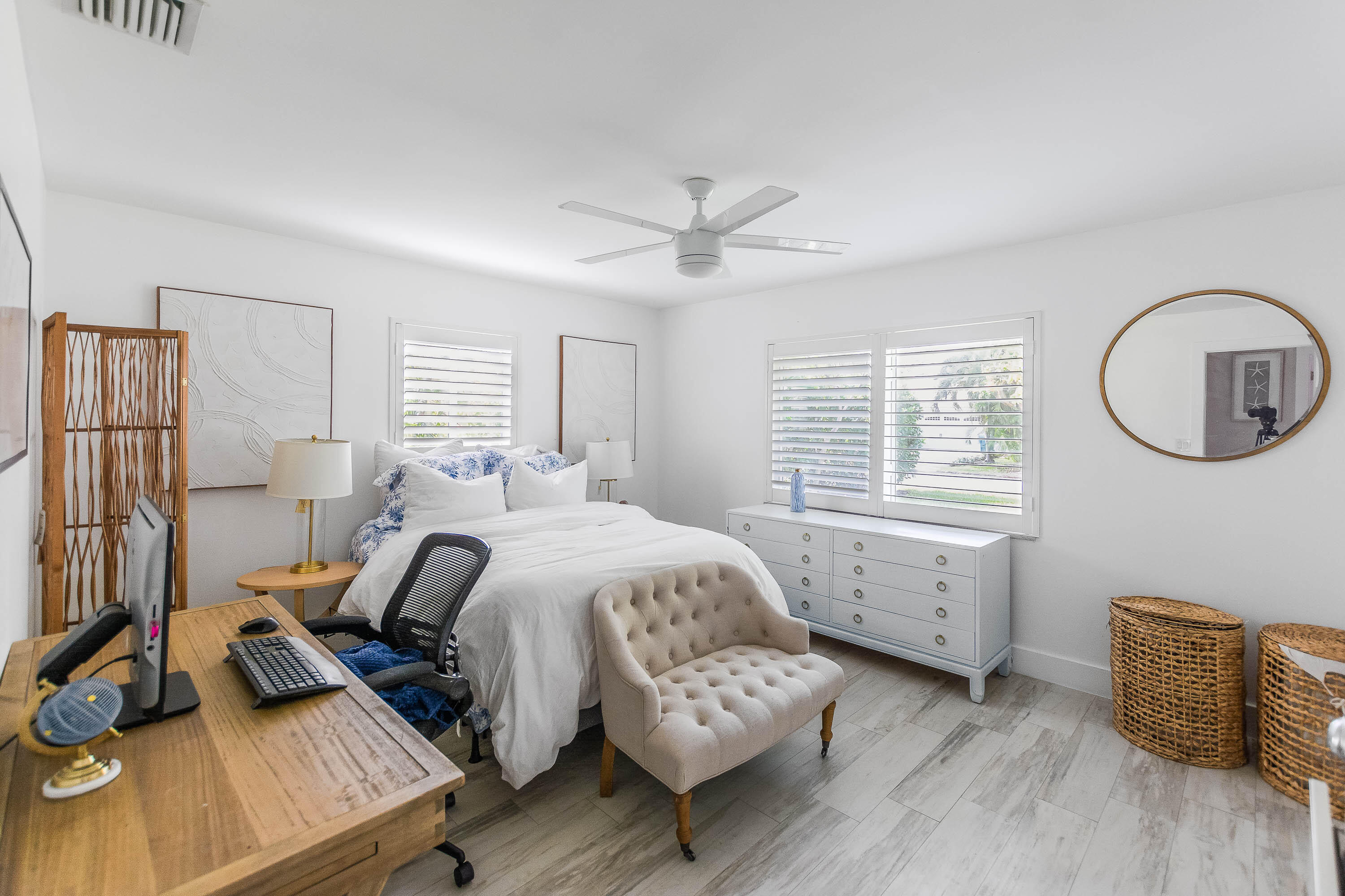 2830 Southwest 5th Street Boynton Beach, FL 33435 - Photo 18 of 26 a bed room with a bed and a couch