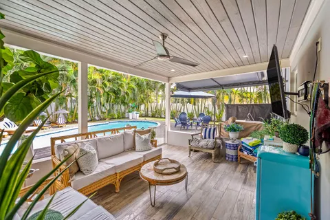 a view of a patio with furniture