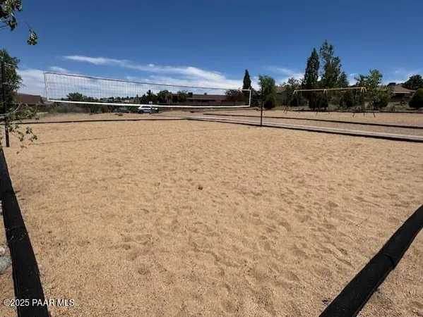 a view of an outdoor space and tennis court
