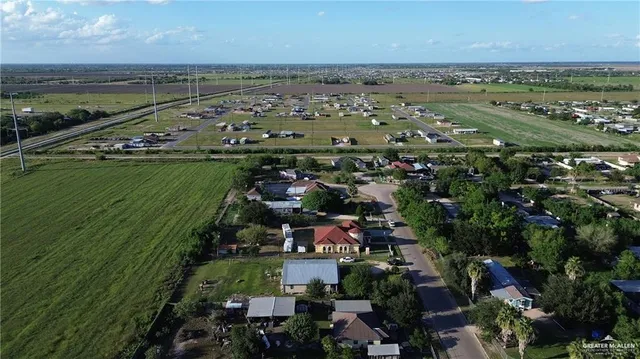 a view of a city with an ocean view
