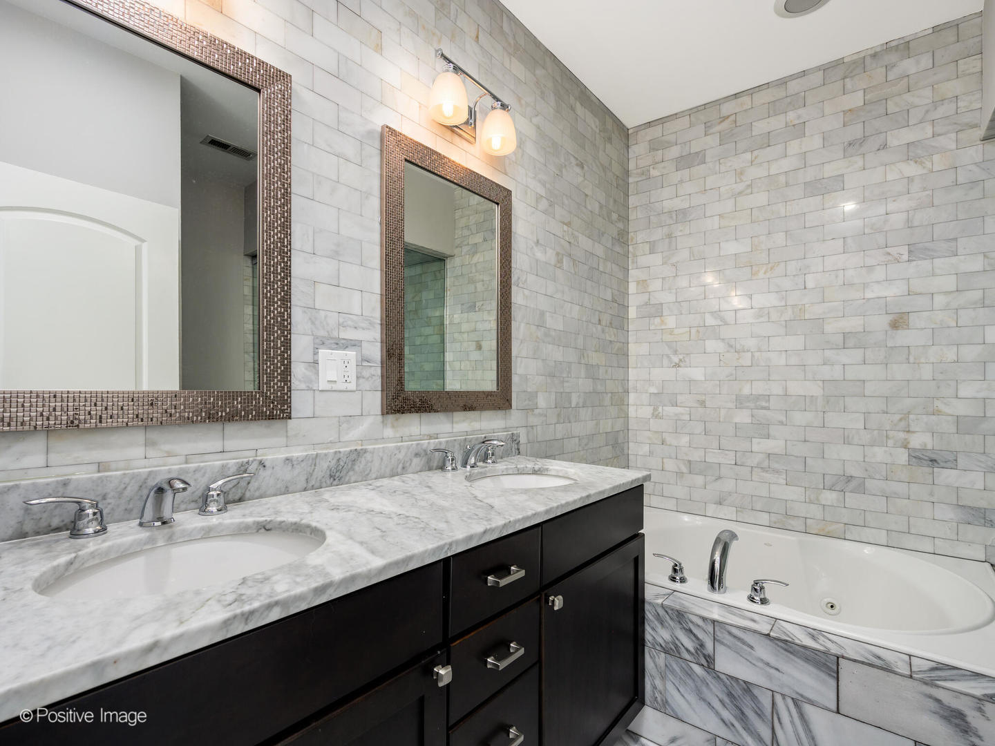 33 North Morgan Street, Unit PH Chicago, IL 60607 - Photo 11 of 24 a bathroom with a granite countertop bathtub sink double and mirror