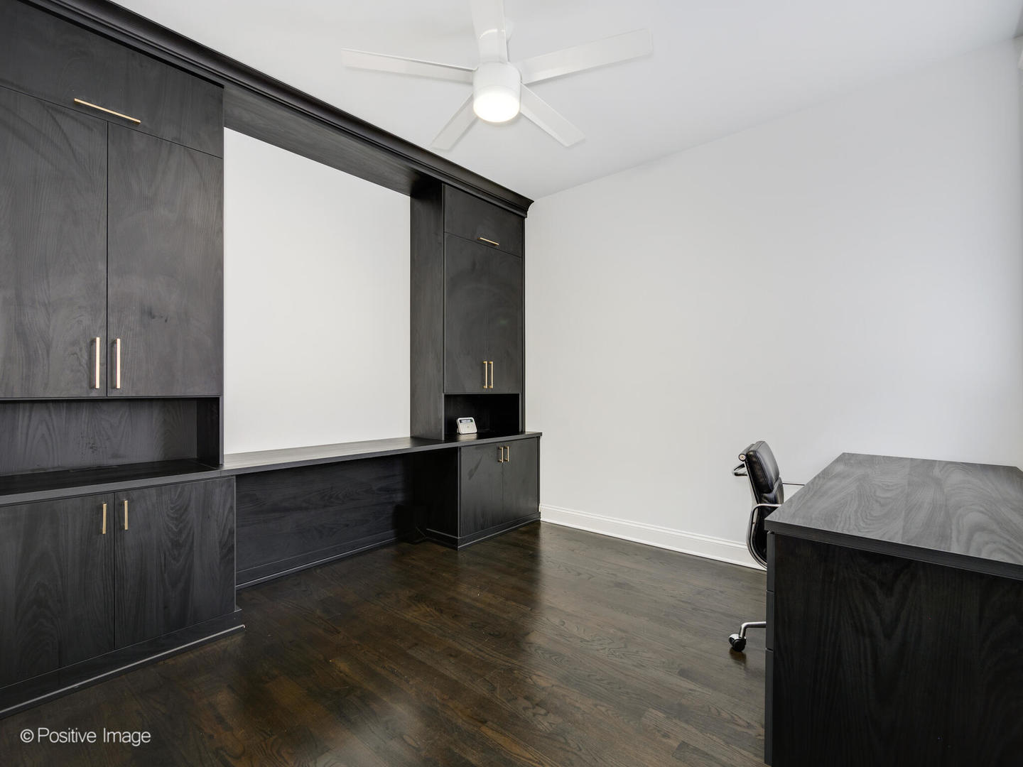 33 North Morgan Street, Unit PH Chicago, IL 60607 - Photo 13 of 24 a view of workspace with wooden floor and cabinet