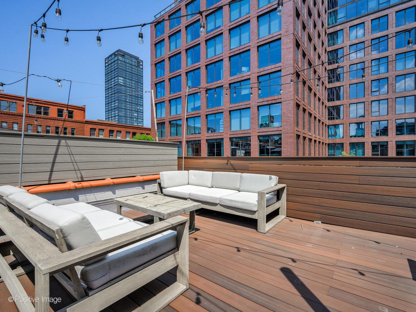 33 North Morgan Street, Unit PH Chicago, IL 60607 - Photo 21 of 24 a view of a building with outdoor seating