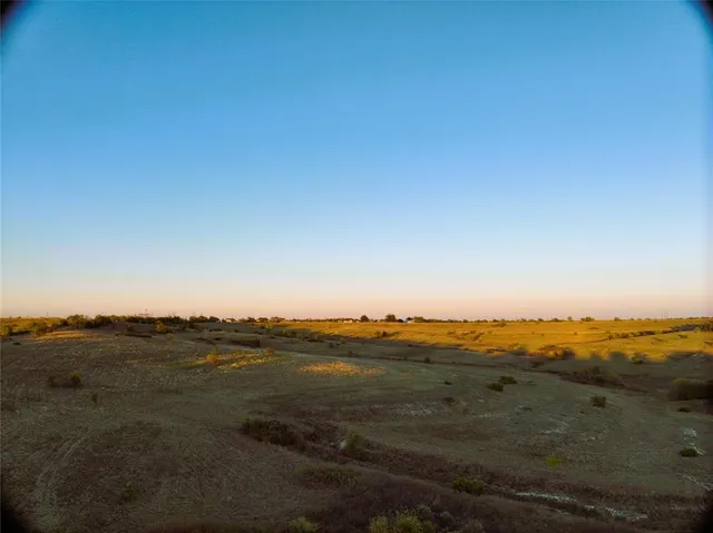 a view of ocean and mountain