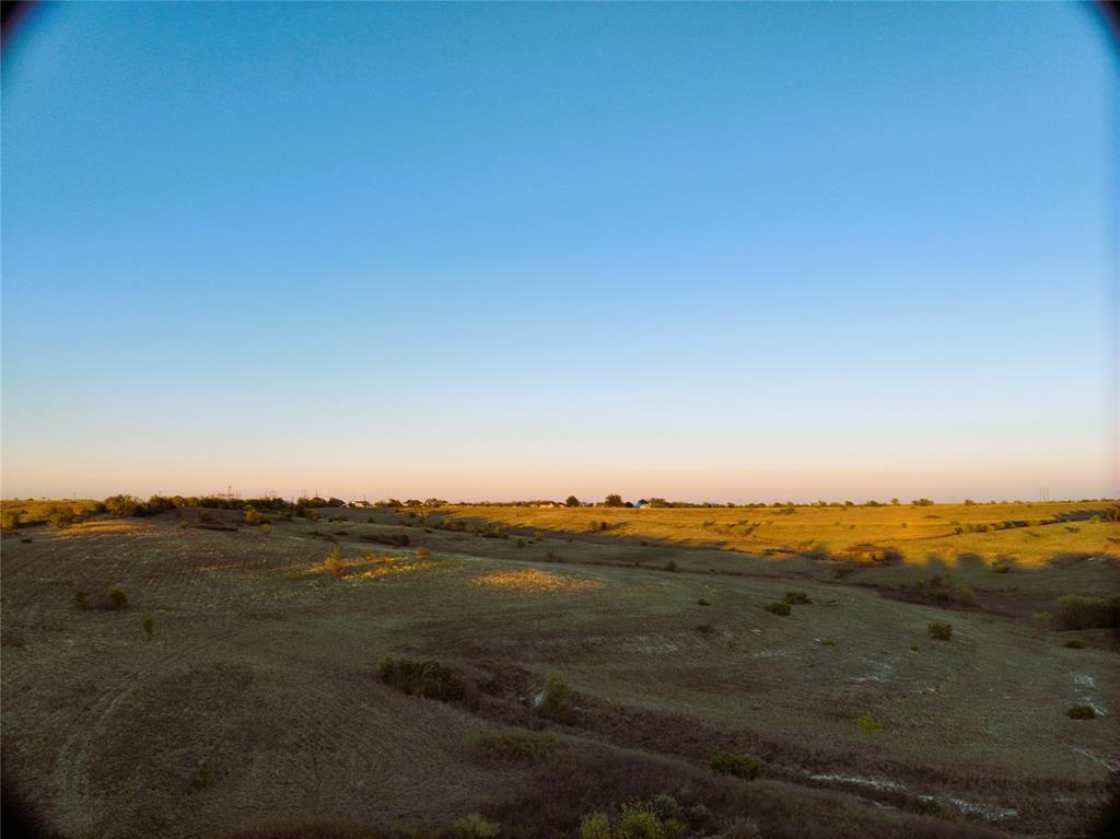 a view of ocean and mountain