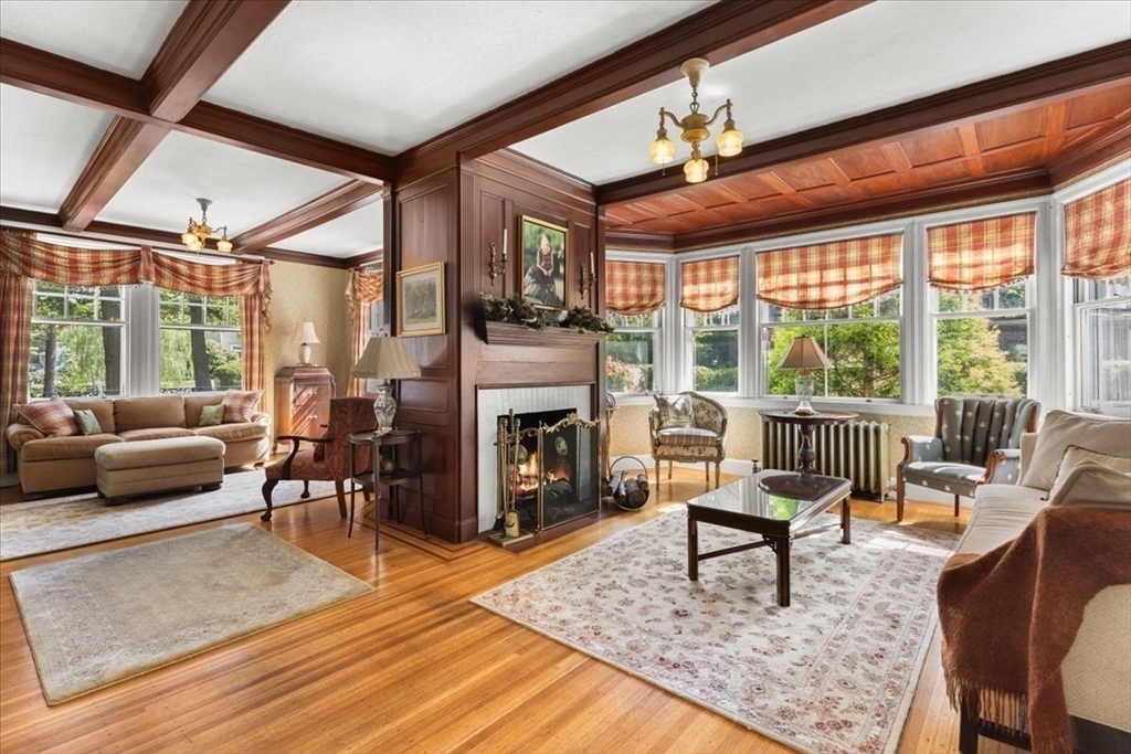 155 Mt Vernon Street Dedham, MA 02026 - Photo 20 of 50 a living room with furniture and a fireplace