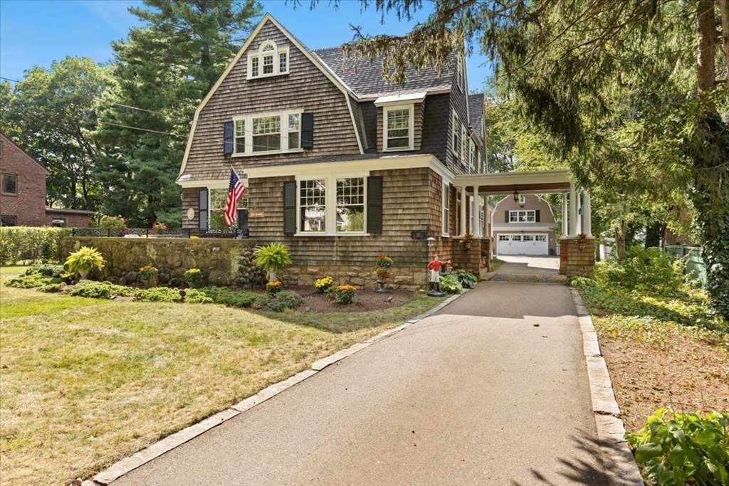 155 Mt Vernon Street Dedham, MA 02026 - Photo 2 of 50 a front view of a house with garden