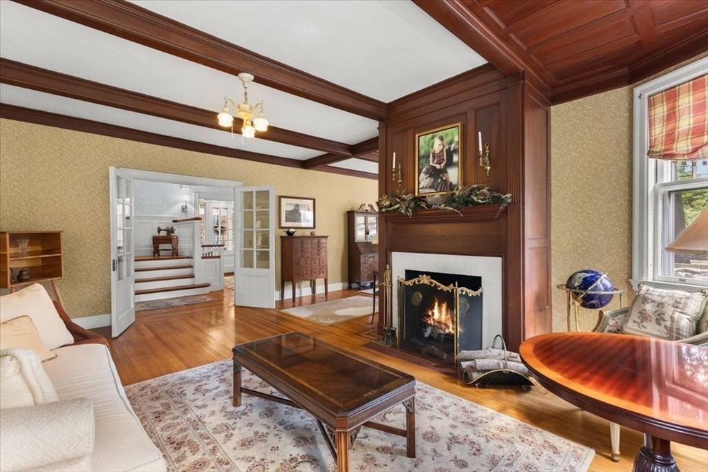155 Mt Vernon Street Dedham, MA 02026 - Photo 21 of 50 a living room with furniture and a fireplace