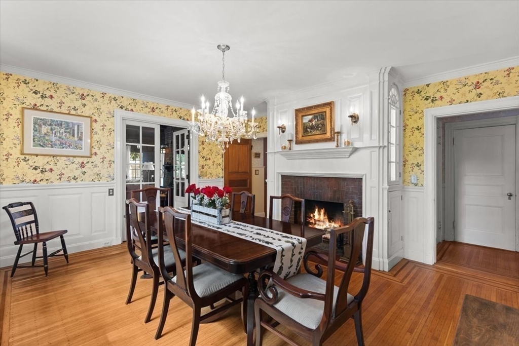 155 Mt Vernon Street Dedham, MA 02026 - Photo 23 of 50 a view of a dining room with furniture and chandelier