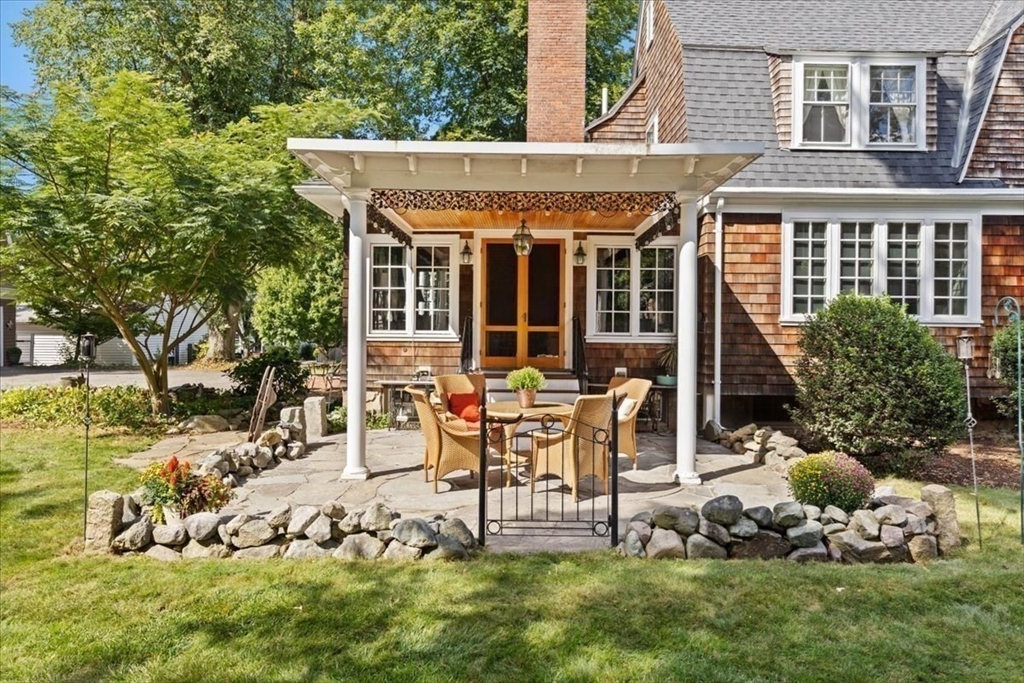 155 Mt Vernon Street Dedham, MA 02026 - Photo 26 of 50 a view of a house with backyard porch and sitting area