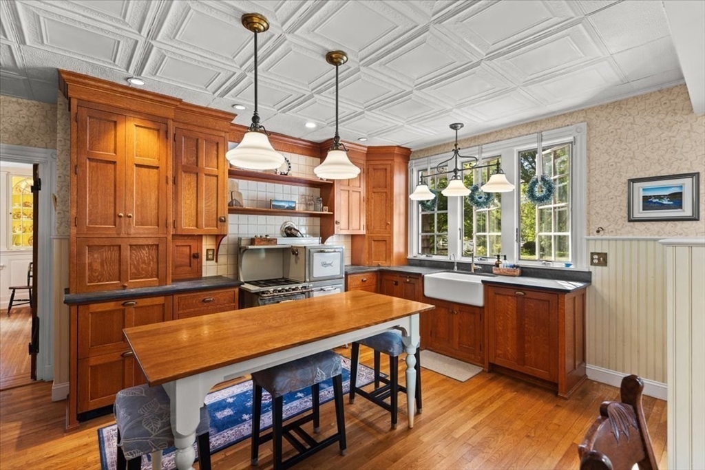 155 Mt Vernon Street Dedham, MA 02026 - Photo 29 of 50 a view of a dining room with furniture window and wooden floor