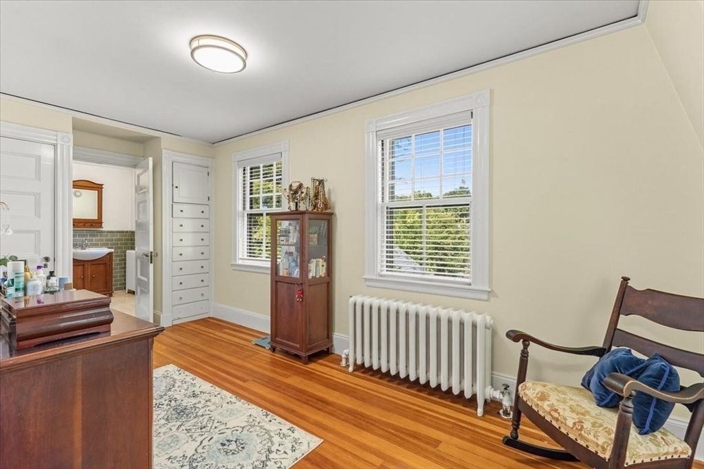 155 Mt Vernon Street Dedham, MA 02026 - Photo 35 of 50 a living room with furniture and a window