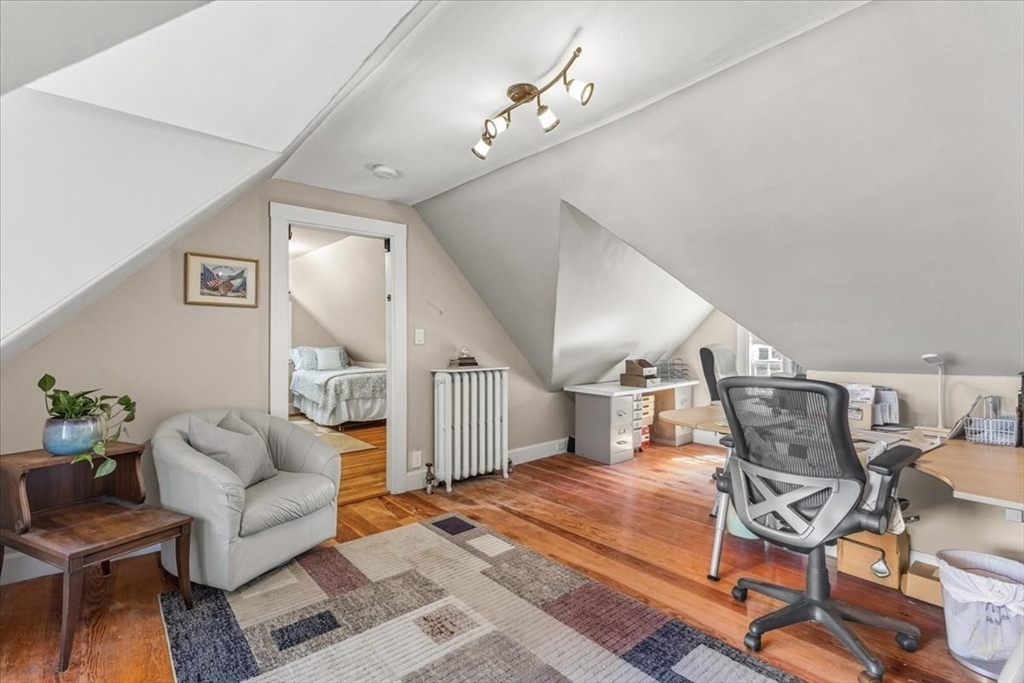155 Mt Vernon Street Dedham, MA 02026 - Photo 41 of 50 a living room with furniture and wooden floor