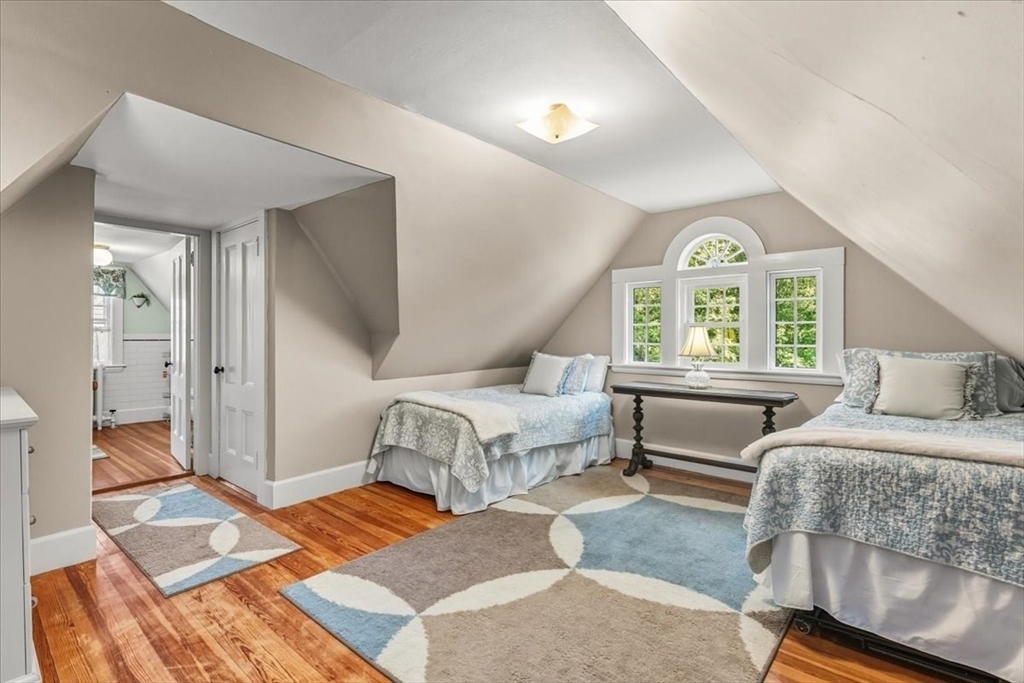 155 Mt Vernon Street Dedham, MA 02026 - Photo 42 of 50 a bedroom with a bed and a large window