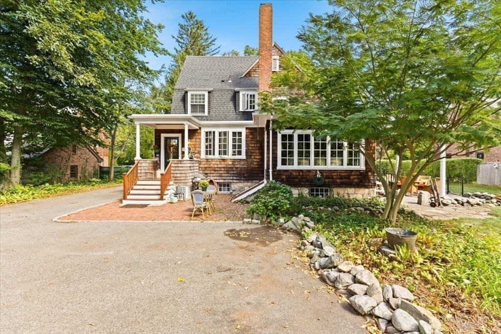 155 Mt Vernon Street Dedham, MA 02026 - Photo 5 of 50 front view of a house with a small yard