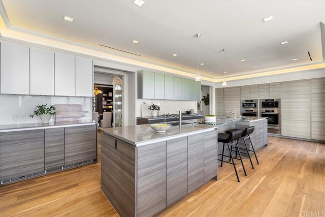 a dining table with chairs and window