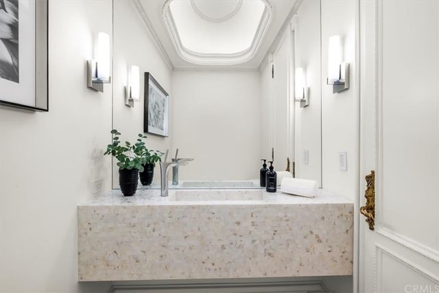 a view of kitchen with refrigerator and window