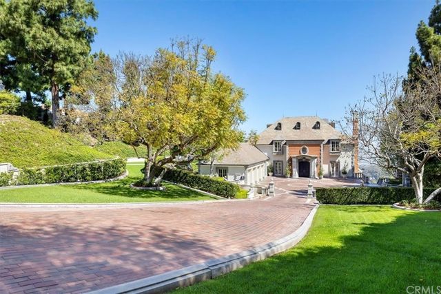 a view of a swimming pool with a garden