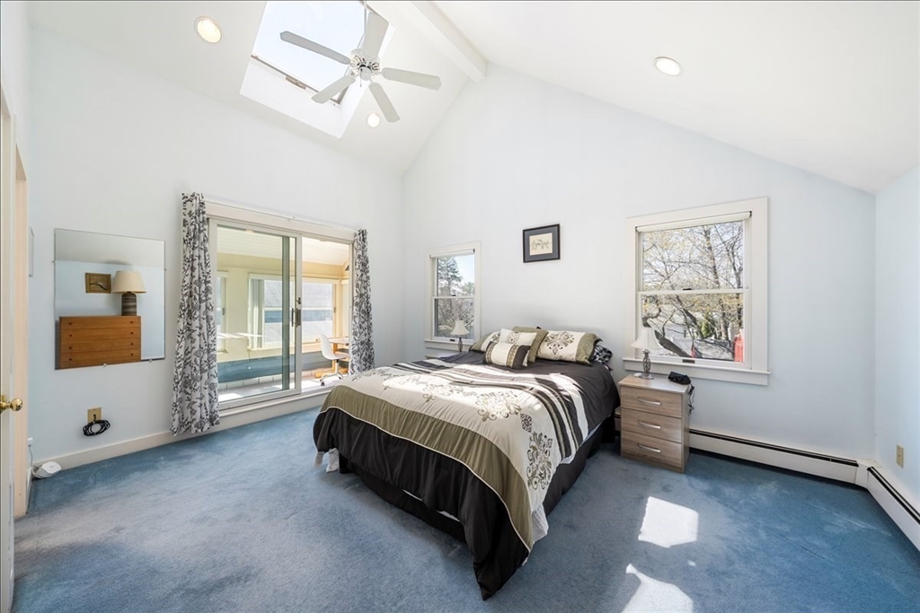 10 2nd Street Natick, MA 01760 - Photo 16 of 31 a spacious bedroom with a bed and a window