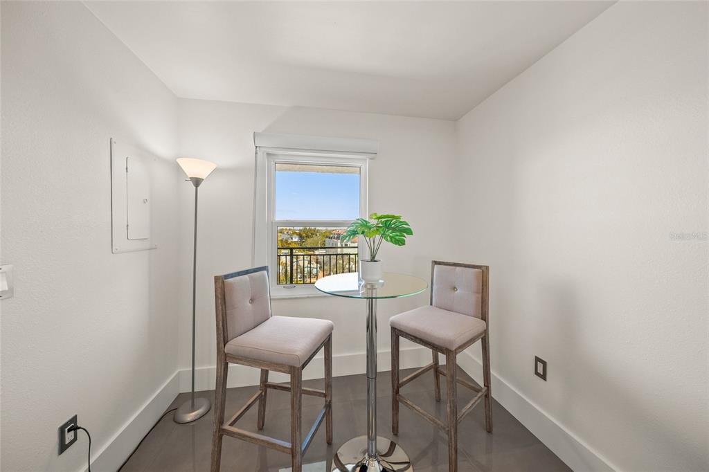 420 Beach Road, Unit 606 Sarasota, FL 34242 - Photo 21 of 83 a view of a dining room with furniture