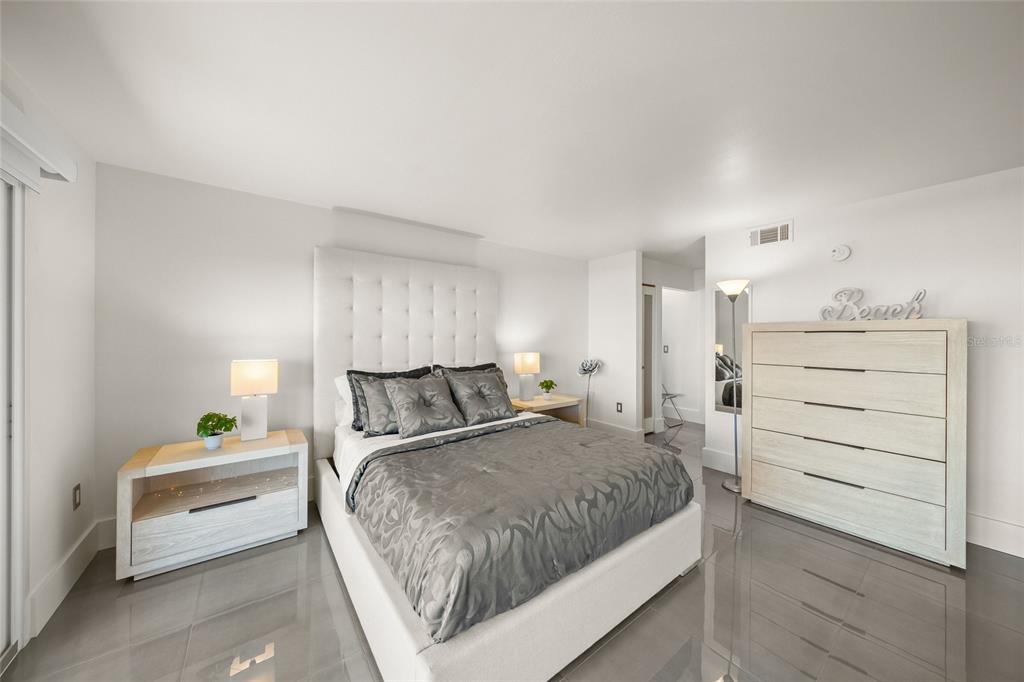 420 Beach Road, Unit 606 Sarasota, FL 34242 - Photo 26 of 83 a bedroom with a bed and closet