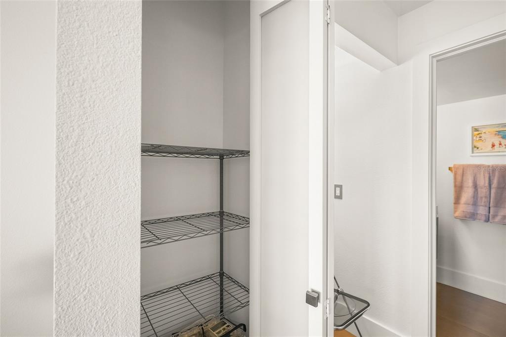 420 Beach Road, Unit 606 Sarasota, FL 34242 - Photo 29 of 83 a bathroom with a glass shower door