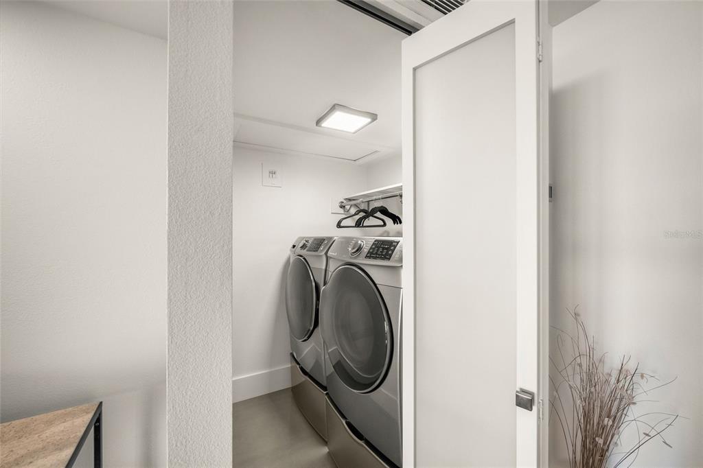 420 Beach Road, Unit 606 Sarasota, FL 34242 - Photo 40 of 83 a utility room with dryer and washer