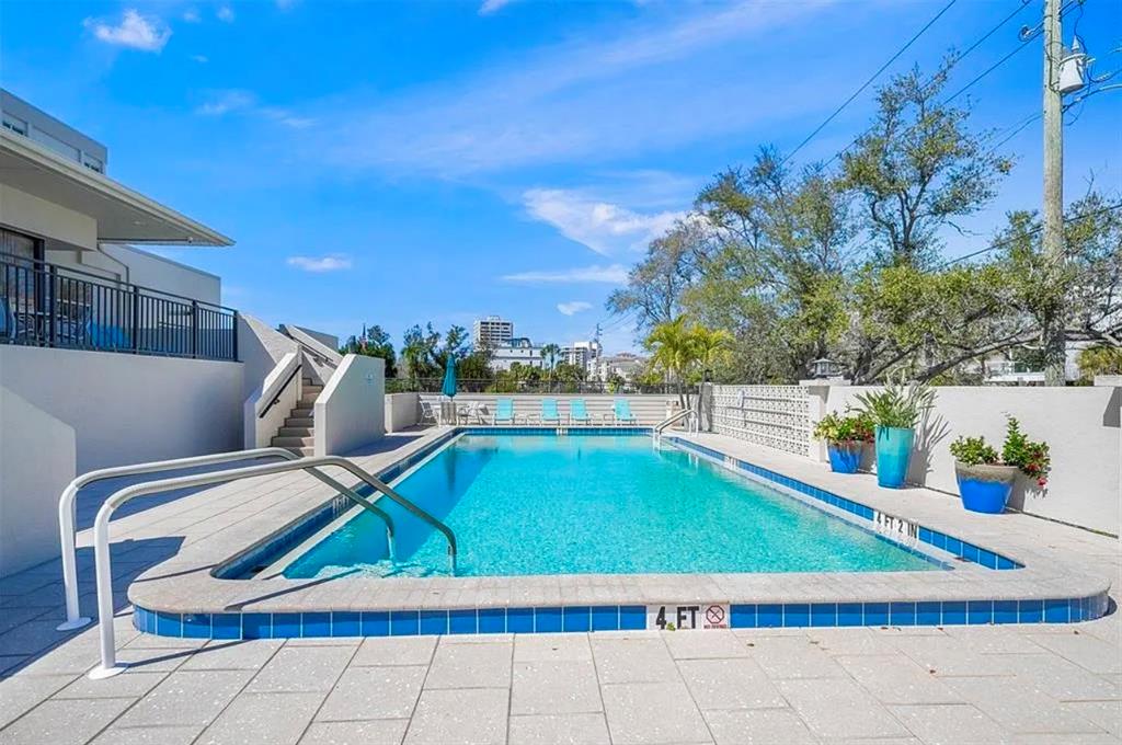 420 Beach Road, Unit 606 Sarasota, FL 34242 - Photo 50 of 83 a view of swimming pool with lounge chair