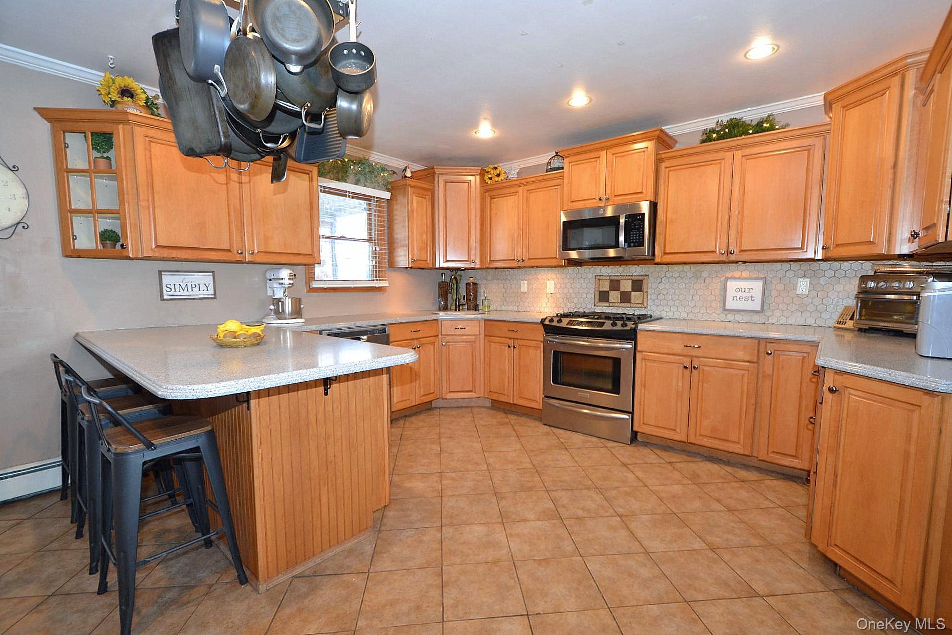 263 North Bicycle Path Selden, NY 11784 - Photo 2 of 23 Propane gas cooking, silestone counters