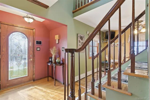 a view of an entryway with hardwood