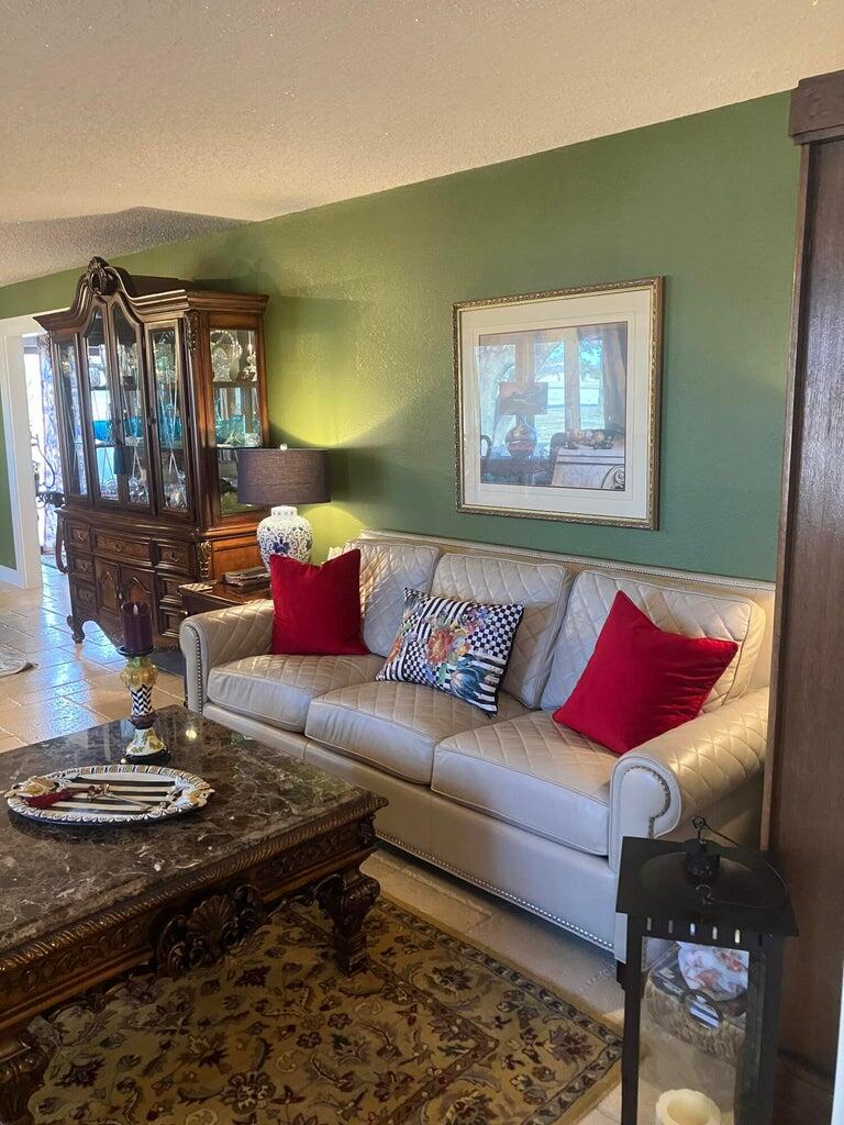 7303 Olton Road Plainview, TX 79072 - Photo 12 of 56 a living room with furniture rug and window