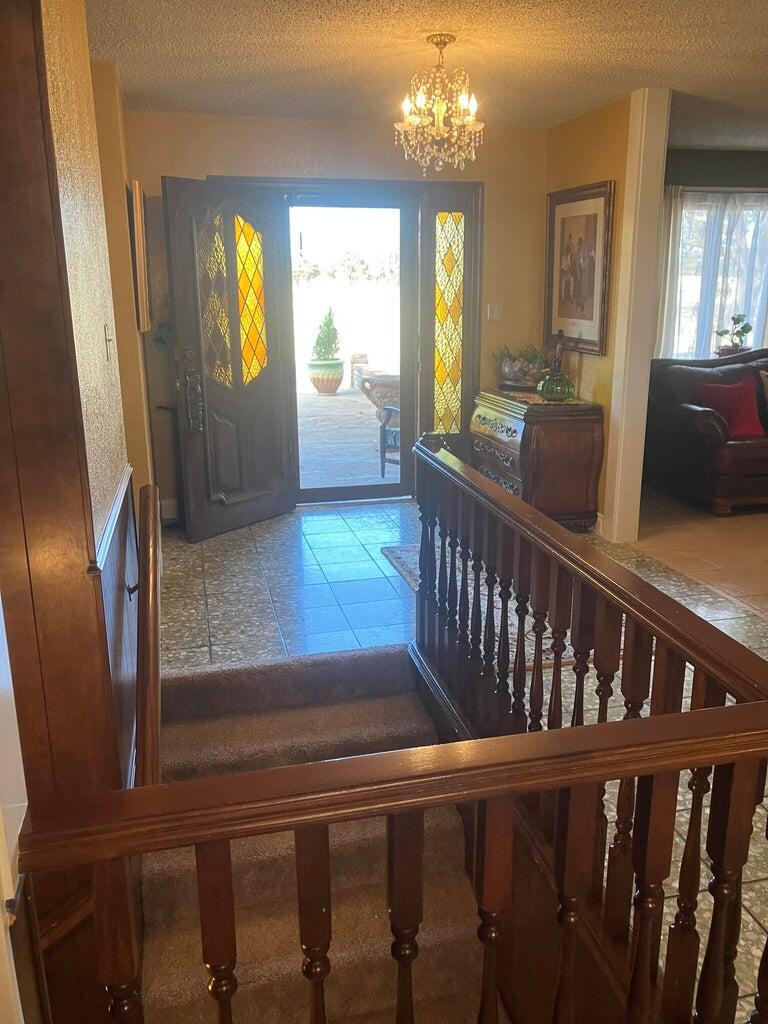 7303 Olton Road Plainview, TX 79072 - Photo 2 of 56 a view of a livingroom with furniture window and wooden floor
