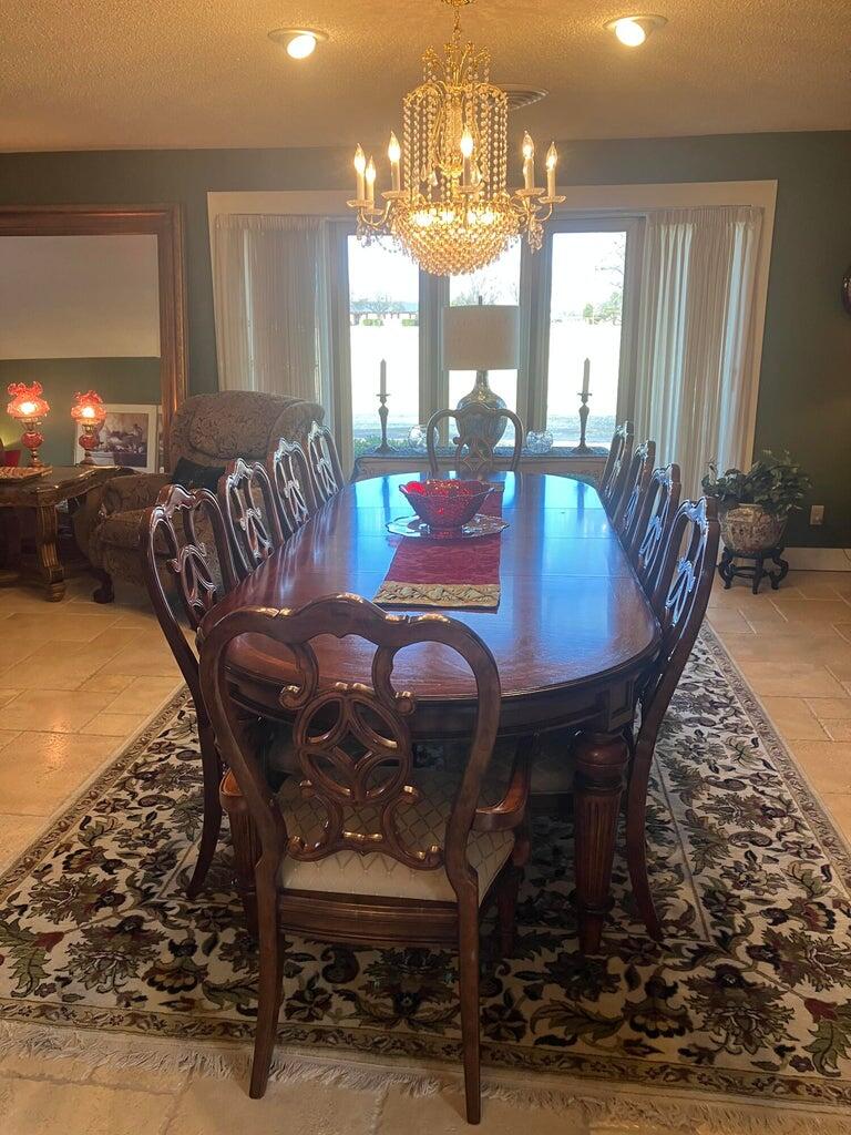 7303 Olton Road Plainview, TX 79072 - Photo 22 of 56 a view of a dining room with furniture