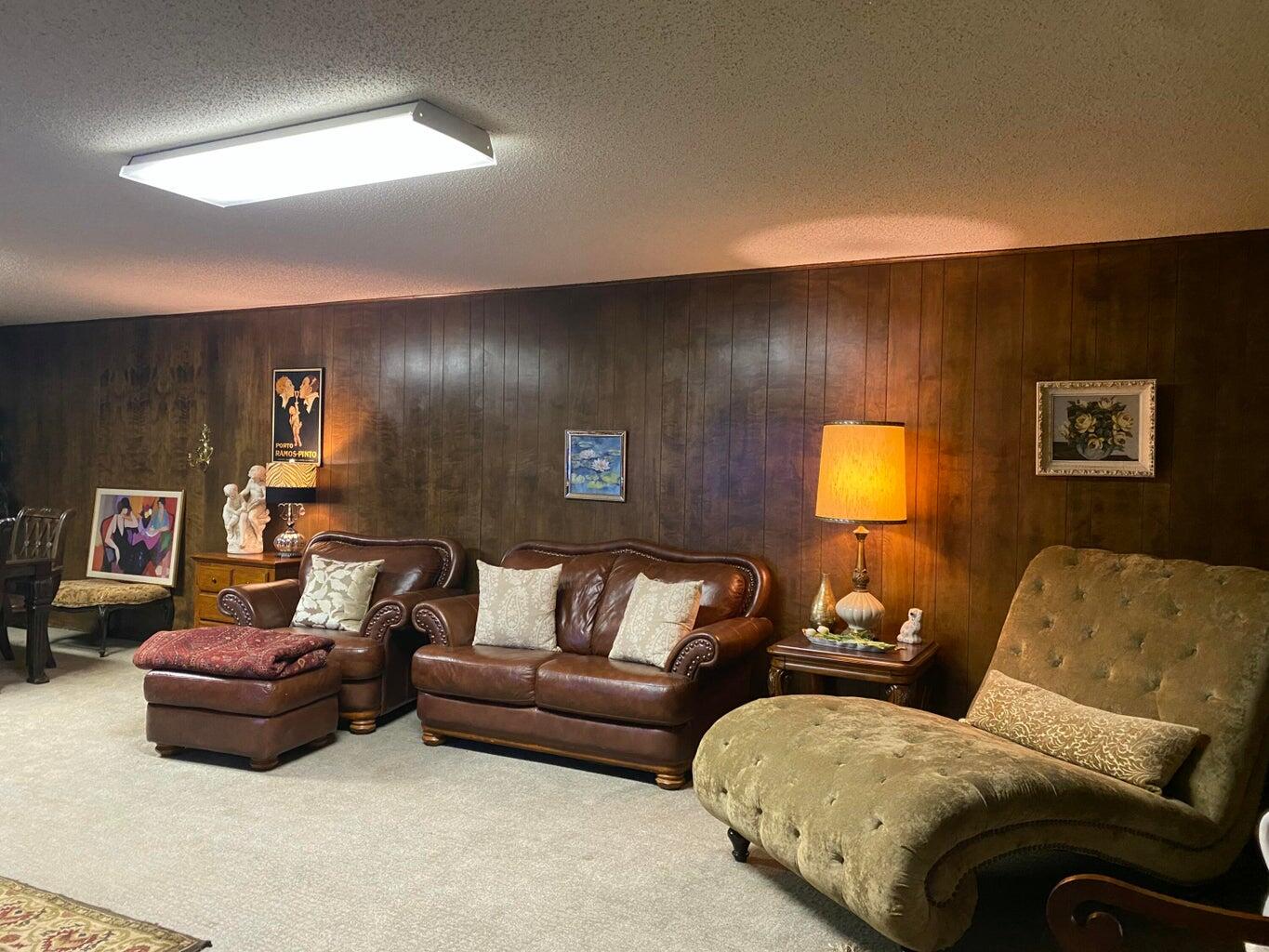 7303 Olton Road Plainview, TX 79072 - Photo 40 of 56 a living room with furniture and a couch