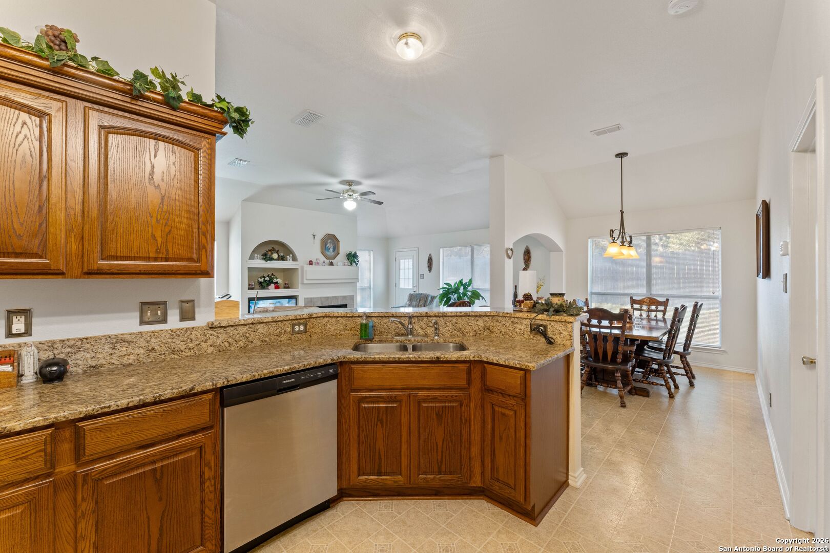 13127 Forum Universal City, TX 78148 - Photo 11 of 33 a kitchen with a sink counter top space and appliances