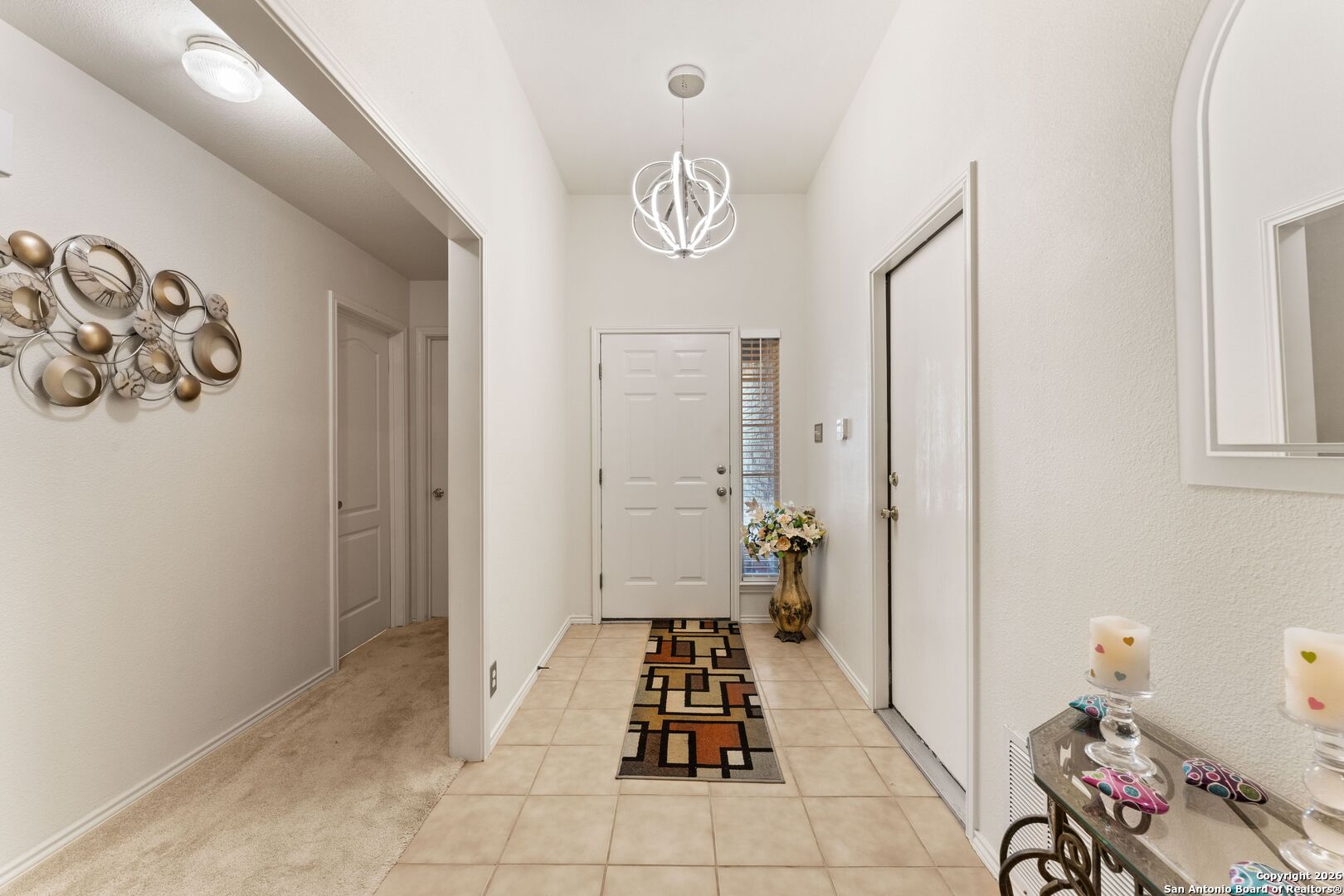 13127 Forum Universal City, TX 78148 - Photo 14 of 33 a hallway with a view of bedroom with a baby crib