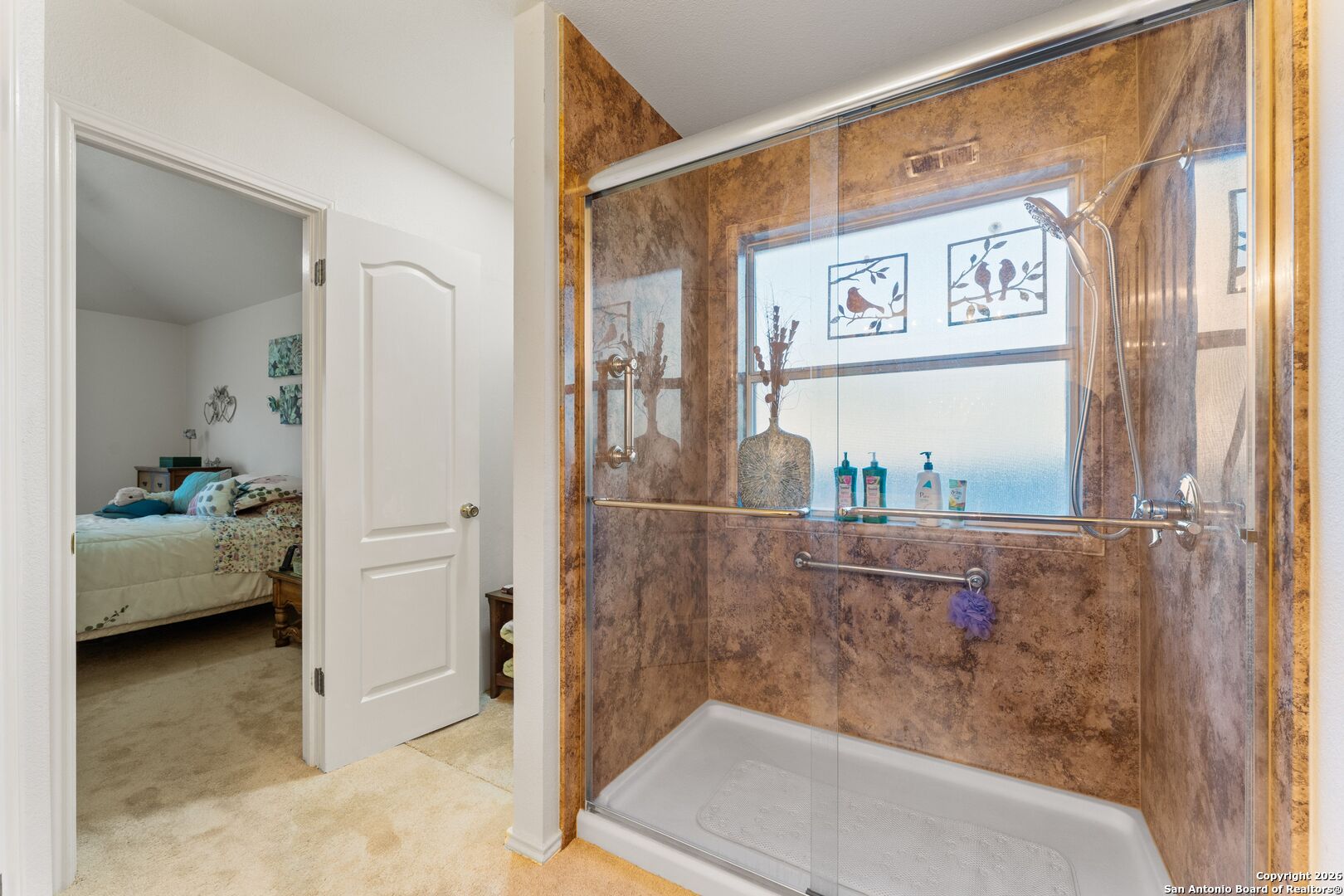 13127 Forum Universal City, TX 78148 - Photo 25 of 33 a bathroom with a bathtub and a shower