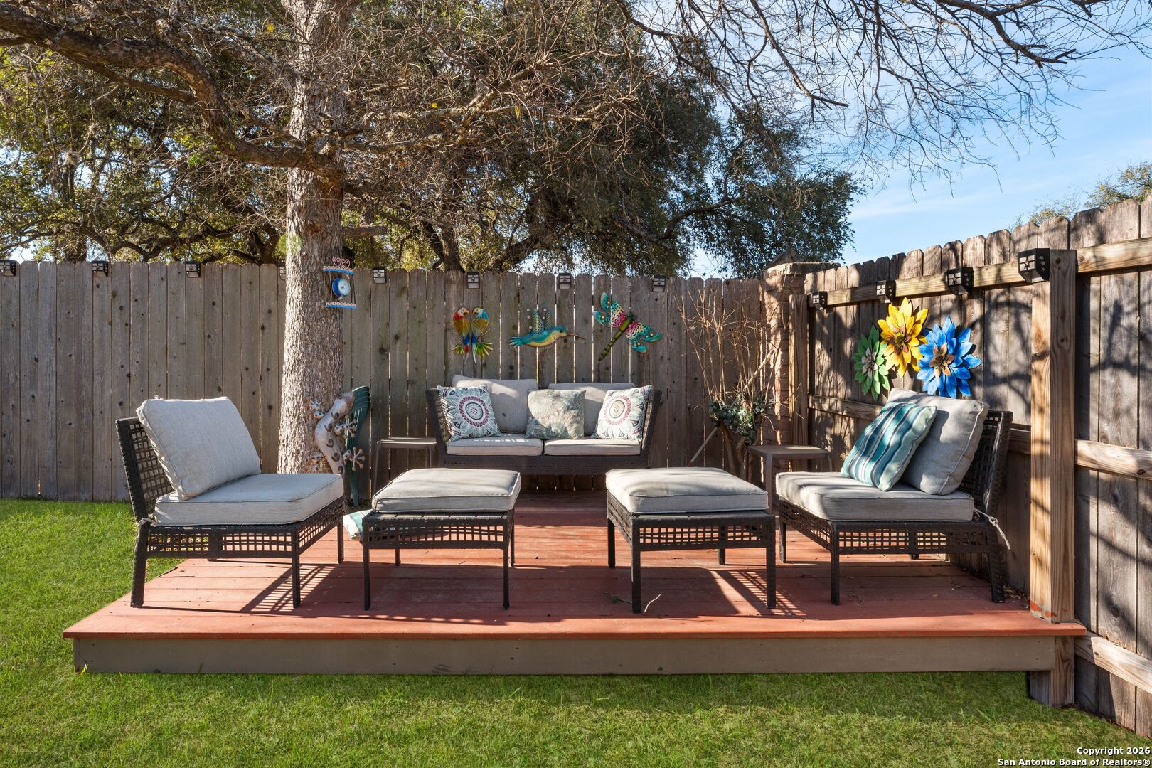 13127 Forum Universal City, TX 78148 - Photo 30 of 33 a view of chairs and table in a backyard