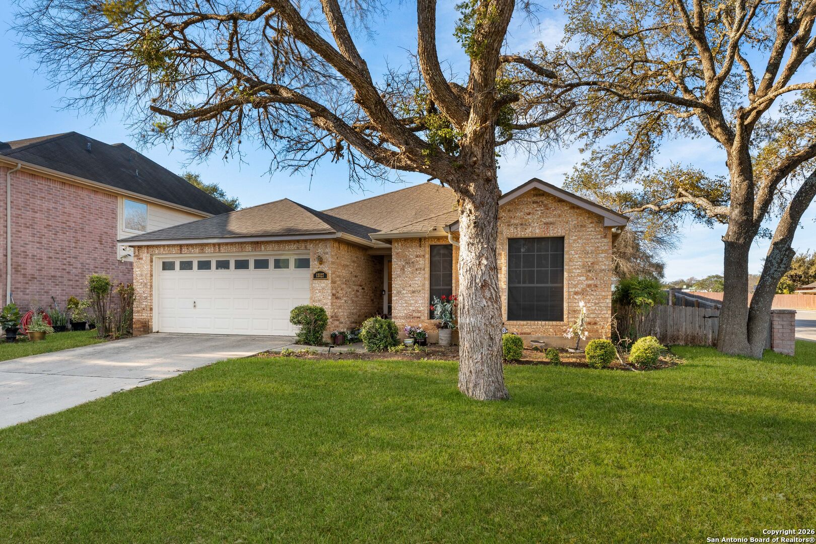 13127 Forum Universal City, TX 78148 - Photo 3 of 33 a view of a house with backyard