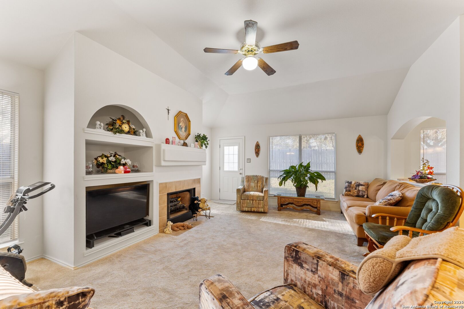 13127 Forum Universal City, TX 78148 - Photo 5 of 33 a living room with furniture and a fireplace