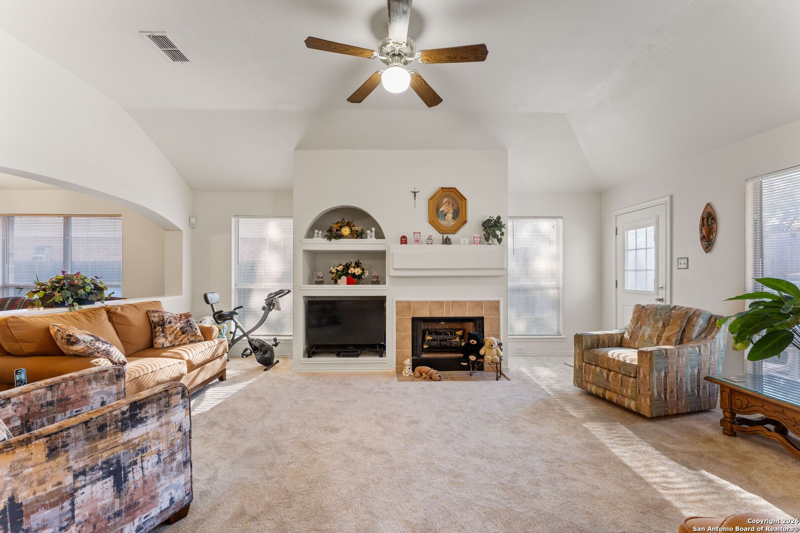 13127 Forum Universal City, TX 78148 - Photo 6 of 33 a living room with furniture and a fireplace