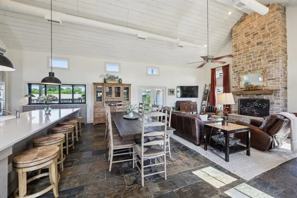 a view of a dining room with furniture window and outside view