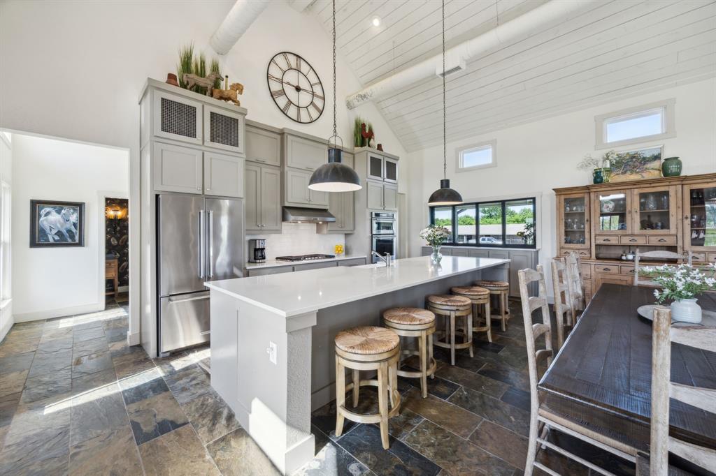5905 Cr-1093 Celeste, TX 75423 - Photo 14 of 40 a large kitchen with a table and chairs