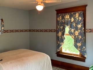 13182 Lyndon Road Morrison, IL 61270 - Photo 15 of 19 a bedroom with a bed and a window