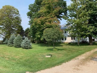 13182 Lyndon Road Morrison, IL 61270 - Photo 18 of 19 a backyard of a house with lots of green space